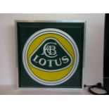 Lotus illuminated wall sign.