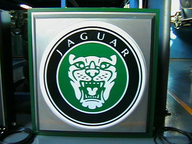 Jaguar single-sided, illuminated sign.