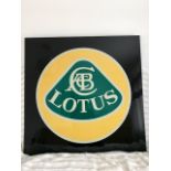 Lotus lacquered sign.