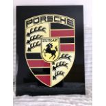 Porsche lacquered sign.