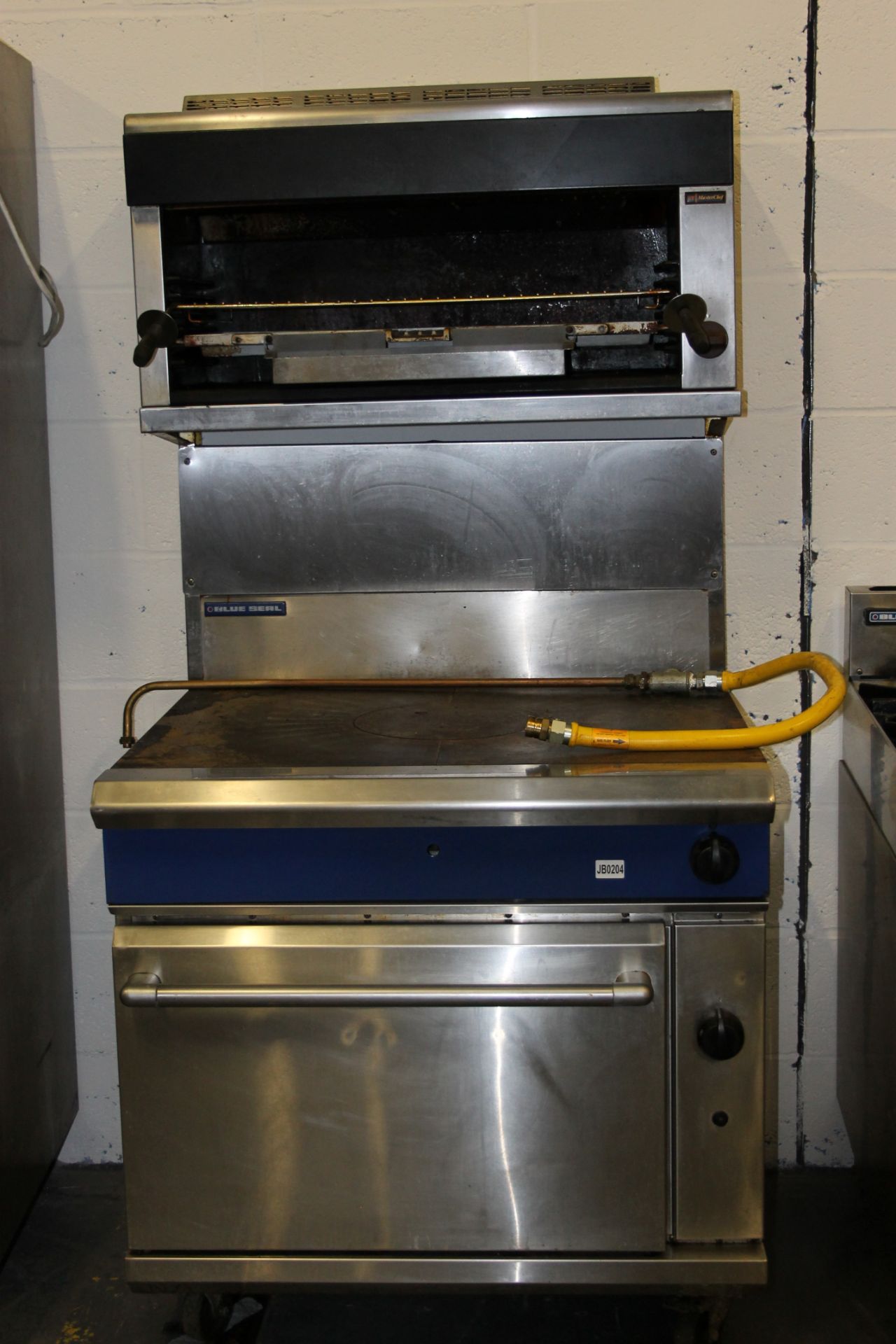 Blue Seal Solid Top Cooker with Double Oven - Gas + Over Head Master Chef Gas Grill