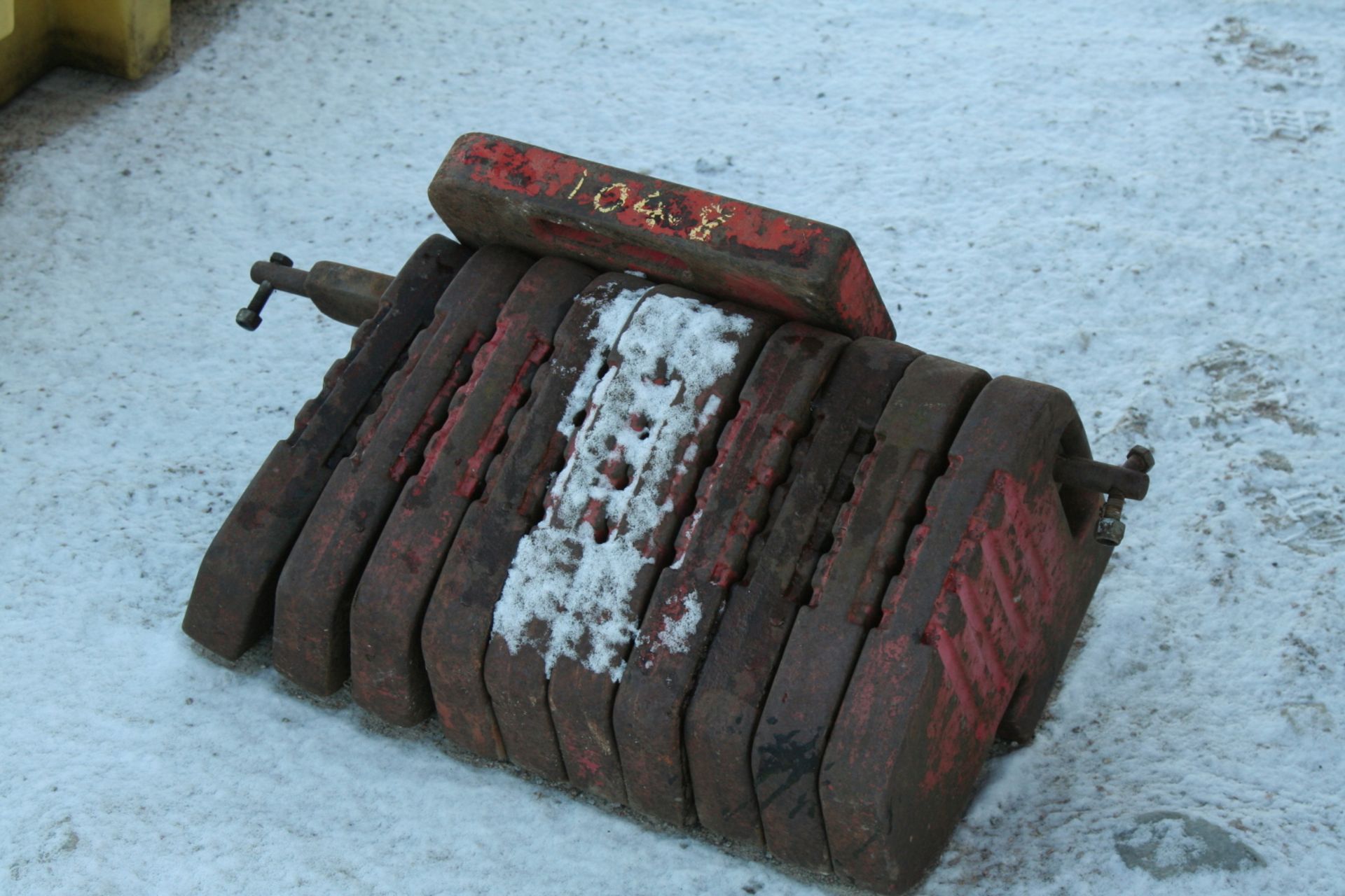 10 X 56LB TRACTOR WEIGHTS & 1 TRACTOR WEIGHT