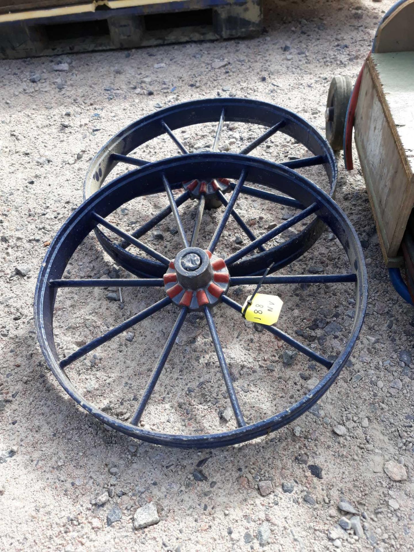 2 CAST IRON WHEELS