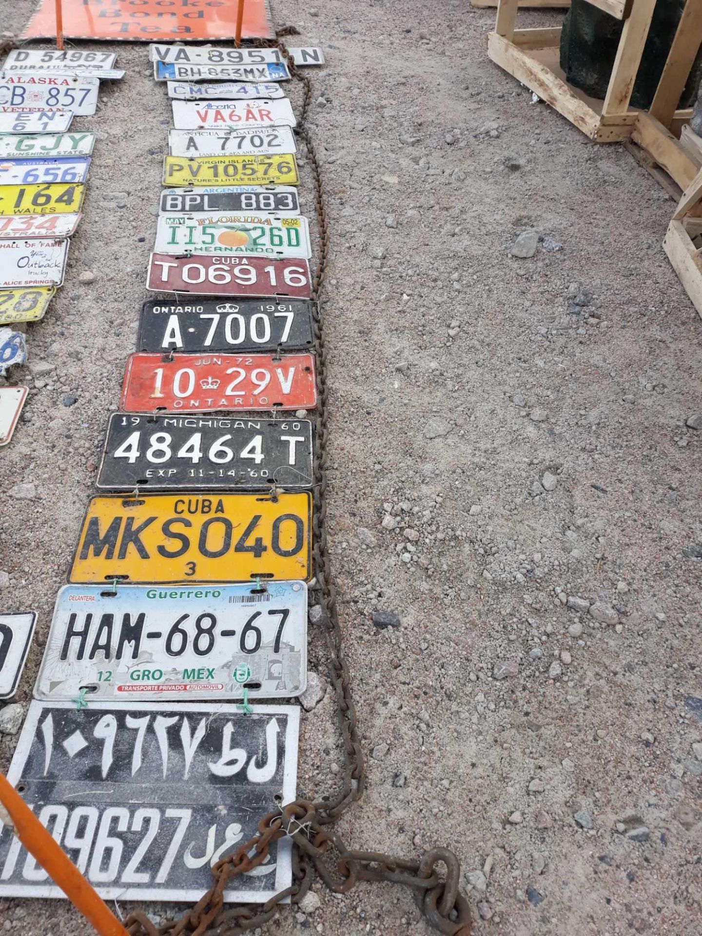 17 NUMBER PLATES ON CHAIN