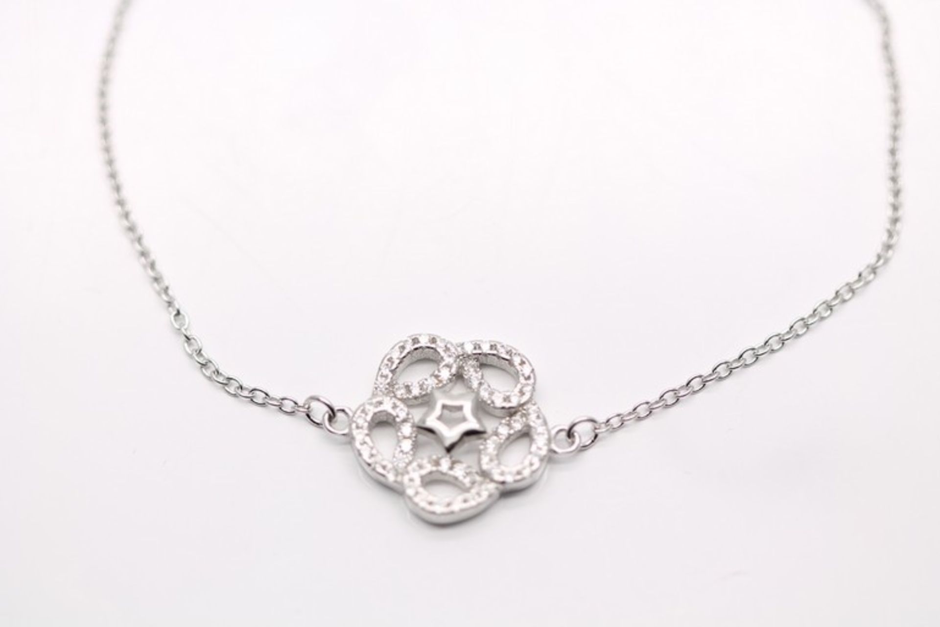 1 x BOXED BRAND NEW SOLID SILVER LADIES BRACELET WITH AAA+ SIMULATED DIAMONDS SET IN A DECORATIVE