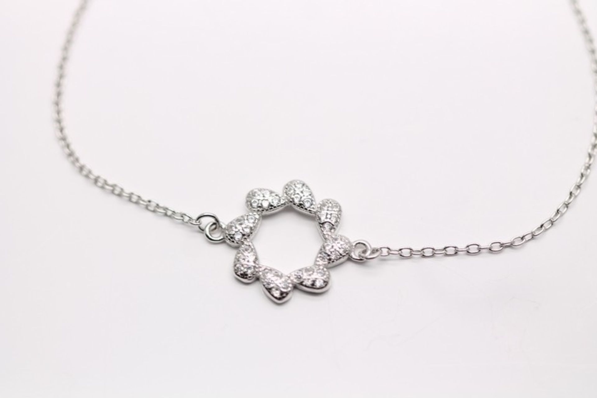 1 x BOXED BRAND NEW SOLID SILVER LADIES BRACELET WITH AAA+ SIMULATED DIAMONDS SET IN A CATHARINE