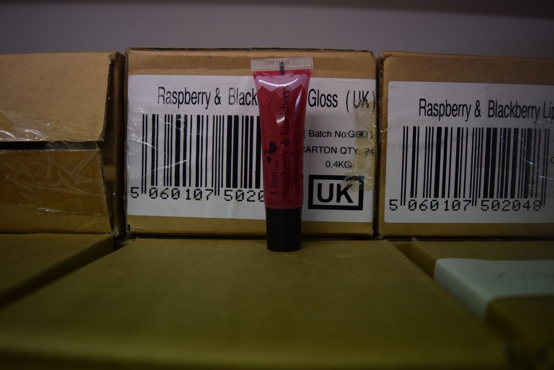 1 X BOX CONTAINING 24 BRAND NEW RASPBERRY & BLACKBERRY LIP GLOSSES