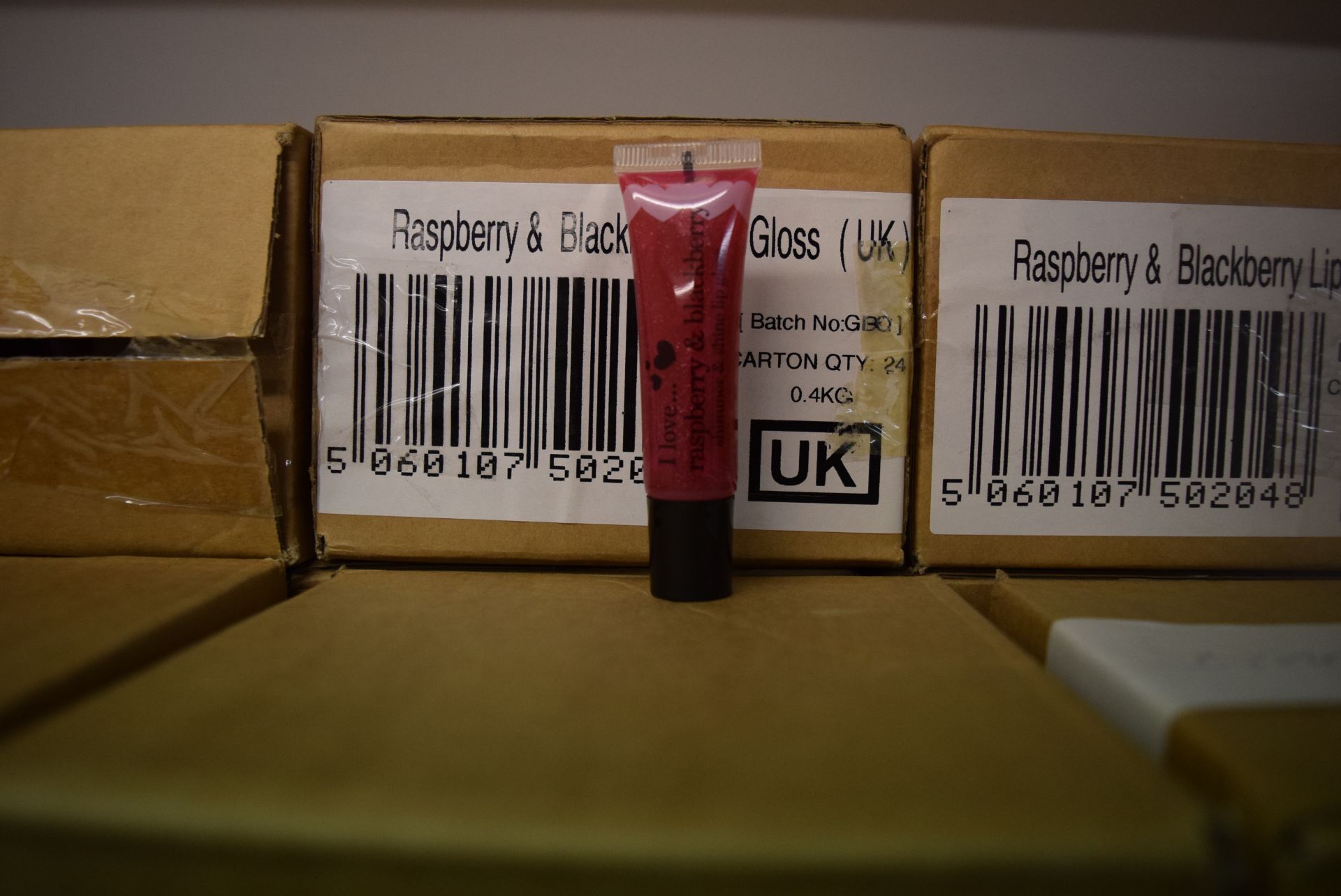 1 X BOX CONTAINING 24 BRAND NEW RASPBERRY & BLACKBERRY LIP GLOSSES