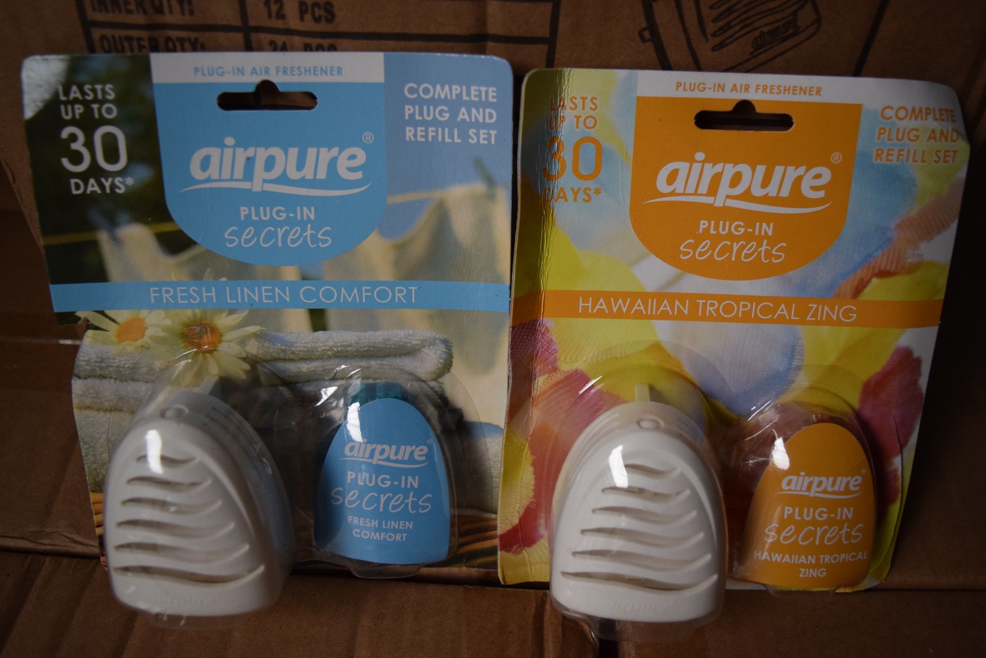 1 X BOX CONTAINING 2 BOXES OF 12 (24 IN TOTAL) OF BRAND NEW SEALED AIRPURE PLUG-IN SECRETS