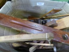 Large box of various hand tools including wooden plane, bow saws, callipers & wooden cramps