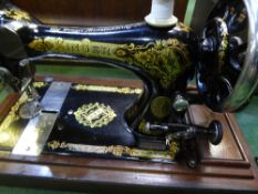 Singer manual sewing machine in a case, Singer sewing machine in a box & 1 other sewing machine (box