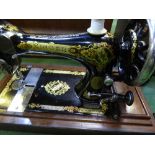 Singer manual sewing machine in a case, Singer sewing machine in a box & 1 other sewing machine (box