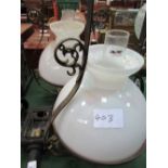 Pair of hanging oil lamps with white shades