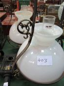 Pair of hanging oil lamps with white shades
