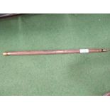 Brass mounted carved wood walking stick converting to a billiard cue