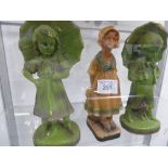 Pair of plaster figurines, boy & girl with umbrellas & a plaster figurine of a young girl