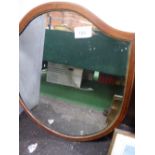 Shield-shaped framed bevel edged wall mirror