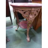 Circular pub table with under shelf on cast iron legs, 24' top, plus similar, cast iron frame only