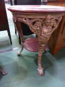 Circular pub table with under shelf on cast iron legs, 24' top, plus similar, cast iron frame only