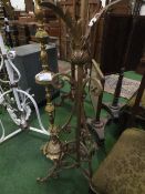 Ornate wrought iron standard lamp