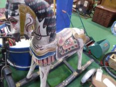 Painted wooden rocking horse on rockers