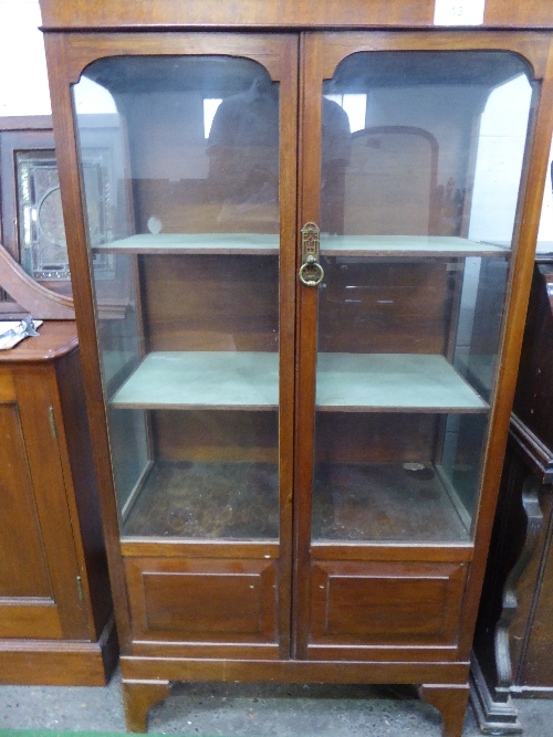 Mahogany display cabinet with double doors, 3 interior shelves & with storage at base, 29' x 59' x