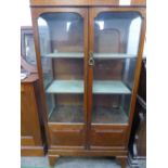 Mahogany display cabinet with double doors, 3 interior shelves & with storage at base, 29' x 59' x