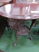 Circular pub table on cast iron legs