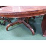 Large oval rosewood tilt-top table, 60' x 42'