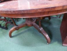 Large oval rosewood tilt-top table, 60' x 42'