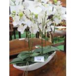 5 artificial orchids in long ceramic vase