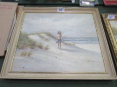 Framed oil on canvas of boy on seashore, signed Jack Wilson