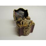 Early 19th Century miniature travelling set with gold metal decorations on red leather covered case,