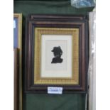A pair of Georgian-era silhouette pictures in black & gold frames
