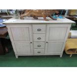 Ducal painted pine cabinet with cupboards either side of 4 drawers, 53" x 21" x 39" high