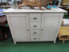 Ducal painted pine cabinet with cupboards either side of 4 drawers, 53" x 21" x 39" high