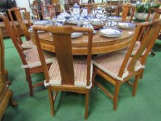 Large Indonesian hardwood circular table with glass cover to top & 'Lasy Susan' also with glass top,