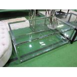 Glass topped low table on chrome frame with glass shelf beneath, 48" x 28" x 18" high