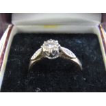 9ct gold solitaire diamond ring with 2 diamonds to each shoulder, size N, 2.0 gms