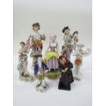 A collection of 7 figurines including Doulton Fagin