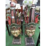 2 large carved wood Balinese female masks on stands