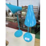 2 light blue coloured desk lamps