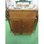 An antique pine 'Wake & Dean' school master's desk with rising lid, 2 ceramic inkwells, cupboard