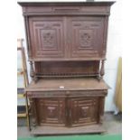 French carved oak dresser of 2 cupboards over 2 frieze drawers & double cupboard, 55" x 87" x 22"