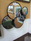 Montage of 5 circular mirrors