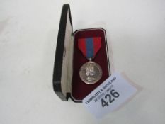 A ERII Imperial Service Medal in original case