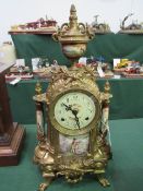 Franz Herule ormolu mantle clock with porcelain panels, with key, in going order. Damage to back