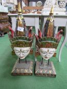 A pair of colourful Balinese face masks on stands, 32" tall