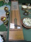 Oak & glass cased electronic regulator clock with visible movement, 61" high x 12" wide