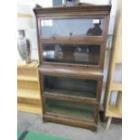 Globe Vernicke-style 4 section cabinet